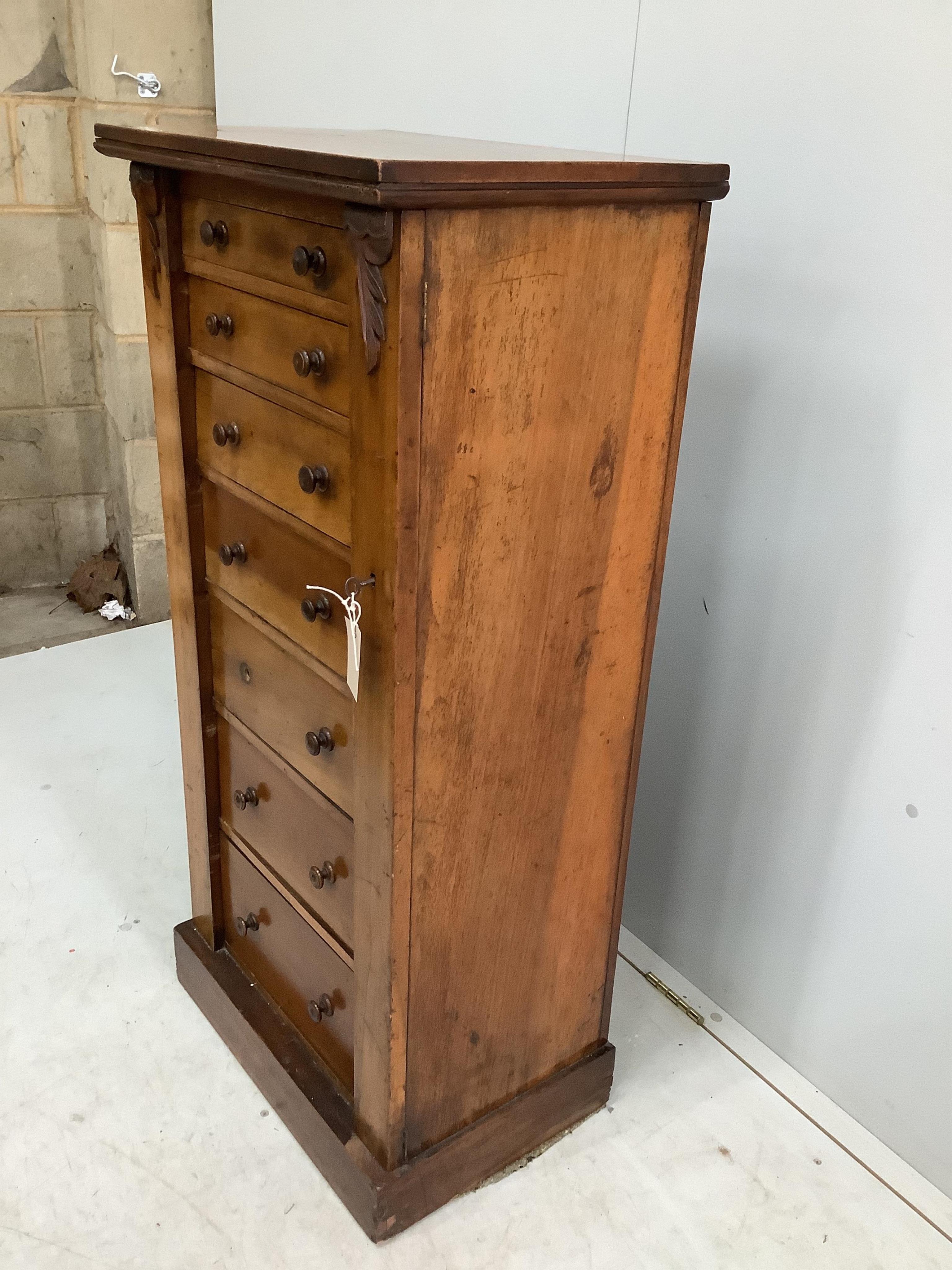 A Victorian walnut Wellington chest, width 54cm, depth 36cm, height 112cm. Condition - fair